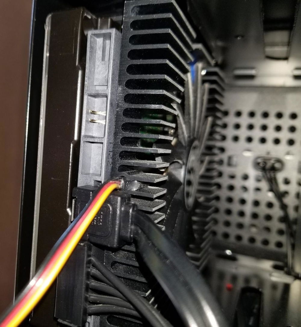 A shot of the drive and PSU side of the Air 740.
This shows the Scythe Ita Kaze HDD cooler.