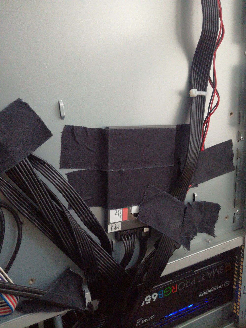 A very jank way to attatch an ssd but it works