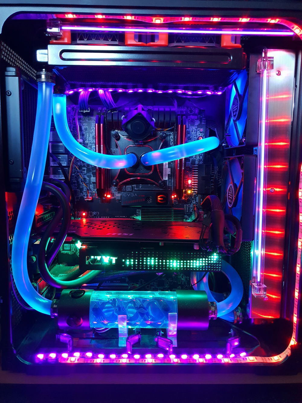 Its final form! Added a small fan to the VRM heat sink since it wasn't getting much airflow. The red LEDs round the perimeter are set to slowly breathing and the ones on the Kraken fade through an RGB loop.