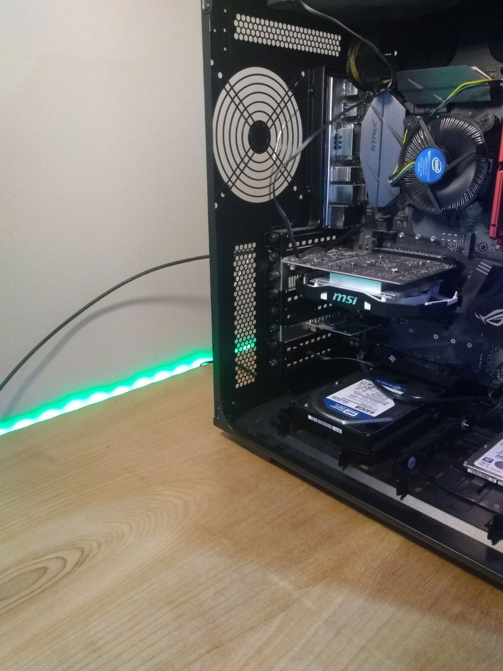 The RGB strip is mounted along the desk