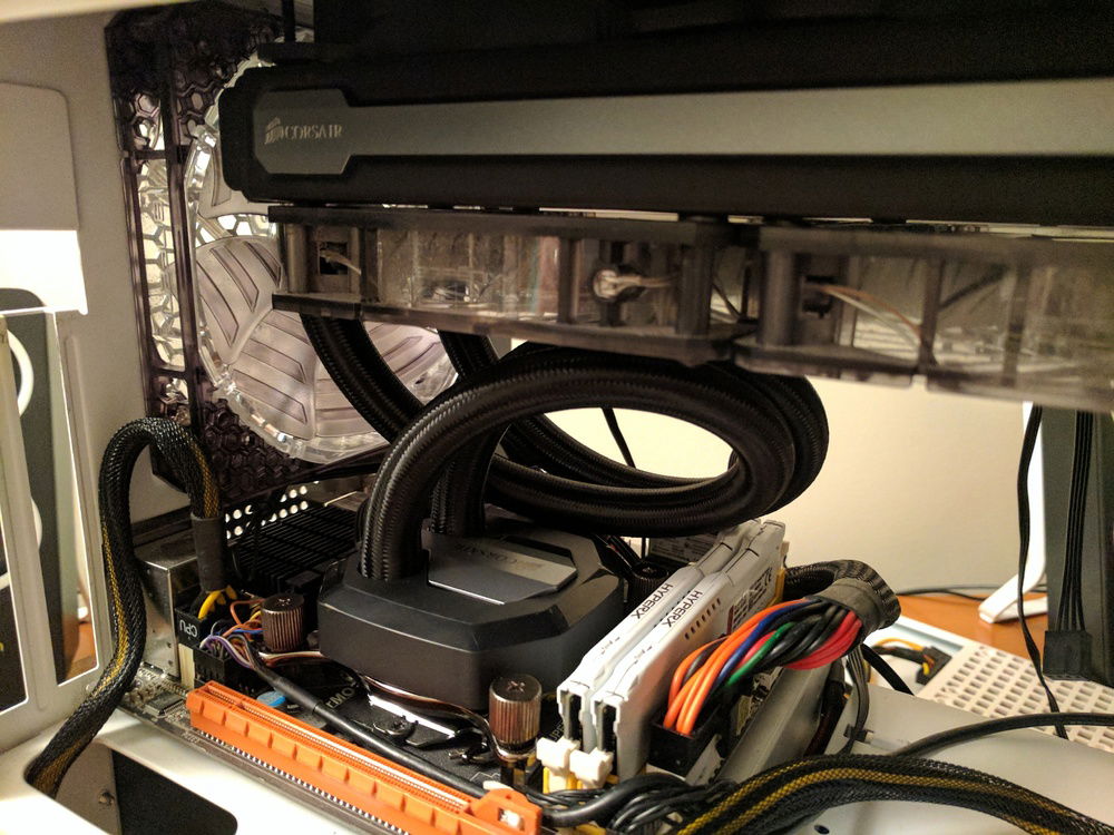 One hella loopdy-loop. The rad has been rotated 180degrees to have the tubes at the front of the case to reduce tension and fatigue on the cooler.