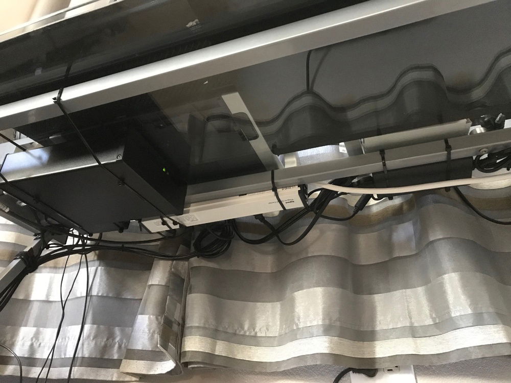 Underneath the Desk, all wires zip tied to the desk frame. The black box is the LH Labs LPS - the power supply for the LH Labs Pulse X Infinity DAC/AMP combo (silly name I admit)