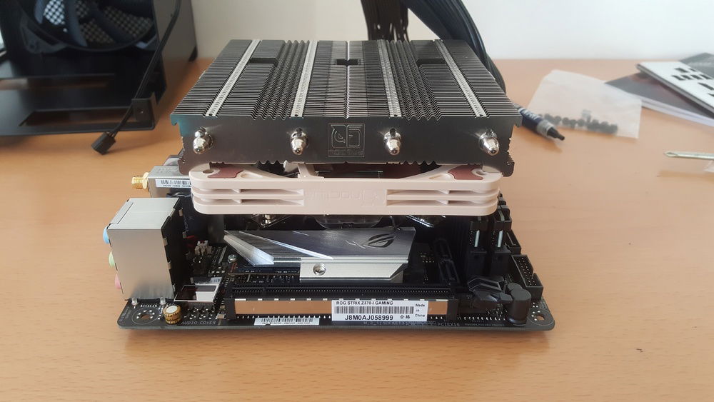 CPU cooler installed. Had to refit it twice because I was unhappy/messed up with the thermal paste application the first 2 times.