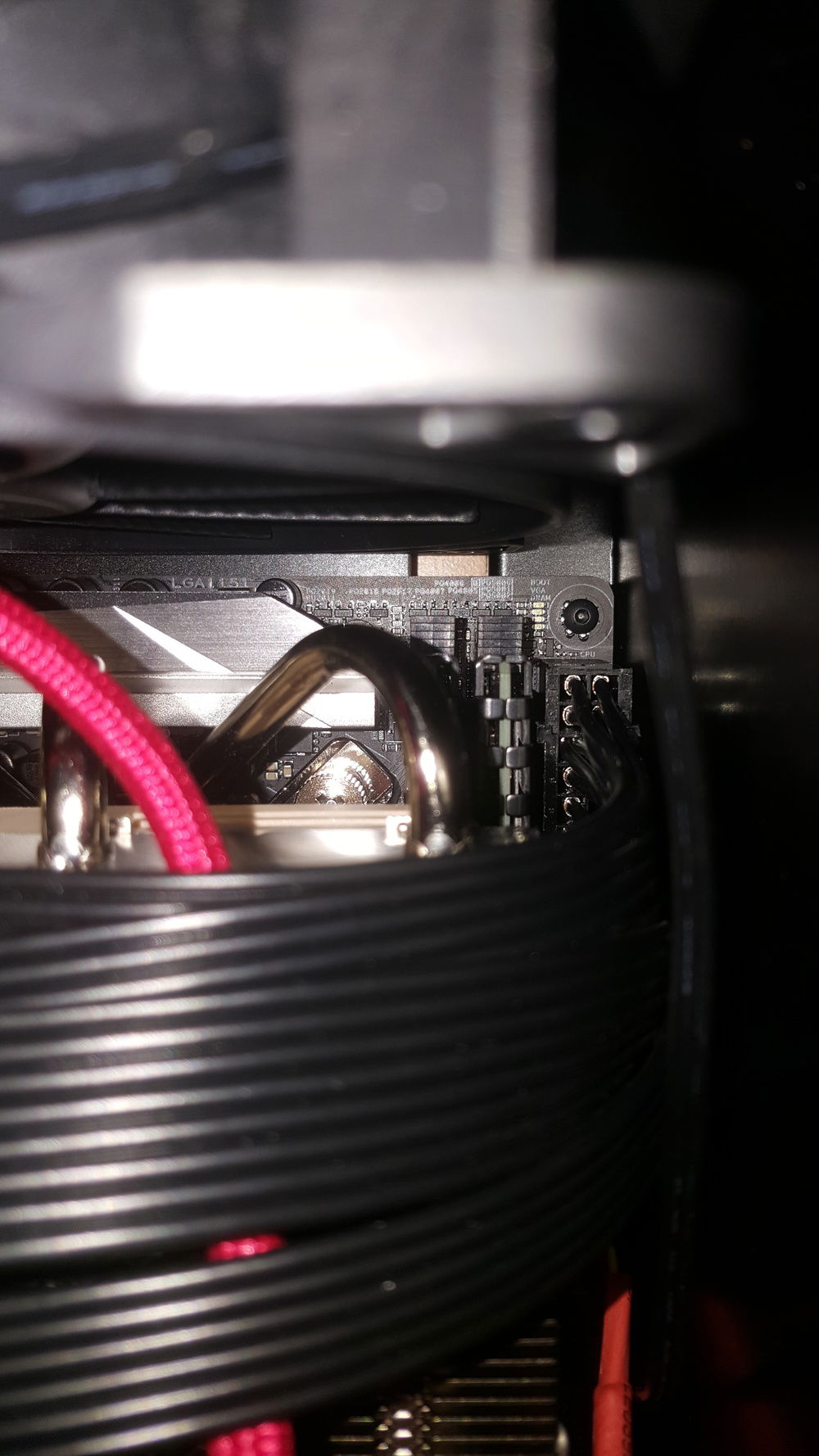 Here are some of the screws I had to reach to secure the motherboard in place. My hex drivers weren't long enough so I had to improvise and bind it to the shaft of a long screw driver with electrical tape. It was a pretty frustrating experience.