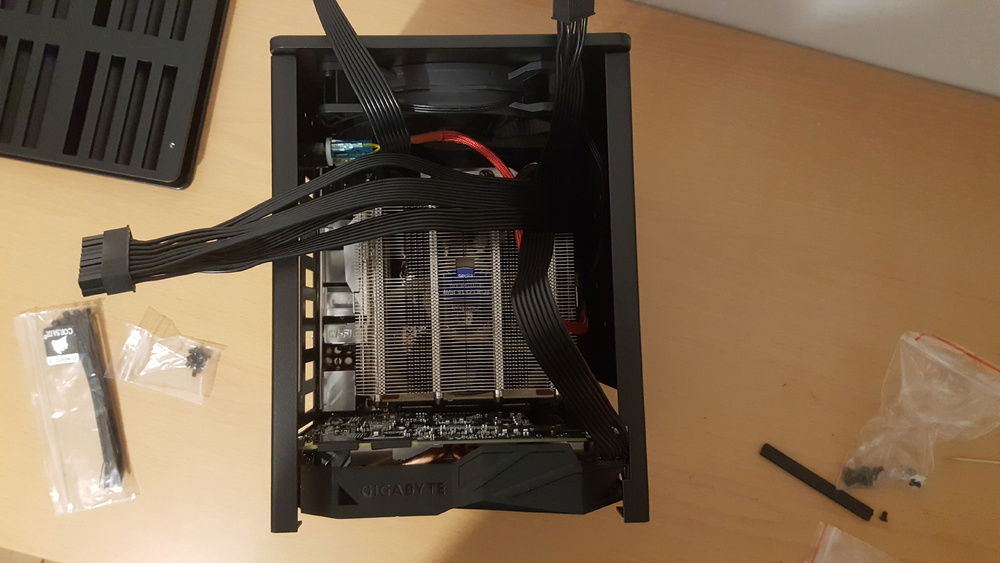 As compact as it gets with these components. There are a couple mm of space between either side of the frame and the exterior shell, which gives room for 1 ODD and 2 x 2.5" Drive Bay internal, both of which not included. One more warning, since most PSUs come with big protruding screws, I had to purchase 6-32 UNC countersunk screws for it to sit flush against the frame. I tried sliding the exterior shell over the original screws at the start and that only served to scratch the shit outta the inside of the shell.