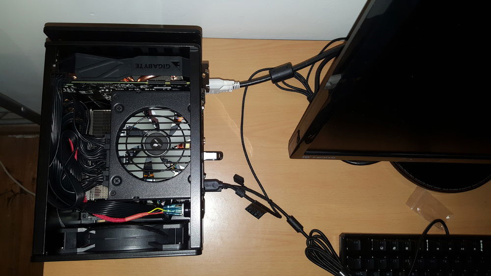 Did I mention I had to take everything apart and reassemble this one more time again? I forgot to attached the power button cable and there simply wasn't enough space to access the power switch and LED pins. Then I went ahead and plugged them in wrong due to my ignorance of cable colours (there were no other indication of + - N, only colours). But managed to use a thin plastic tool to push the cables into place down the small gap in the side of the case, zip ties were used to keep the cable heads together.