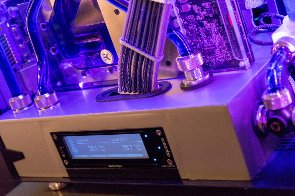 Here we have the custom shroud I built to house the Aquaero 6 XT, which then evolved into a shroud for tube routing, temp sensors to hide, and to help support the GPU.