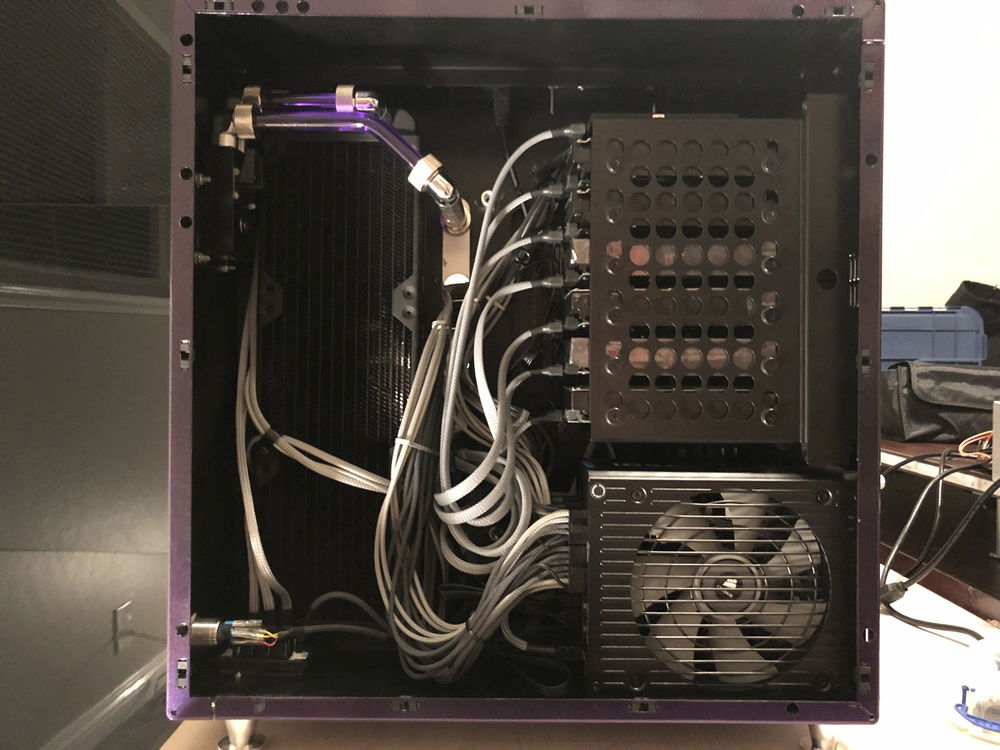 And finally, the third layer, where it all comes together!  PSU is added,  all 18tb of storage installed, cables plugged in, and this side is done! Until I decide to remake my cables.