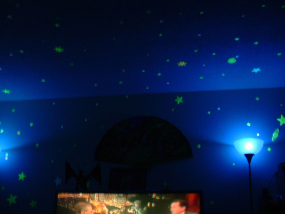 Living room black light ambience for movies.