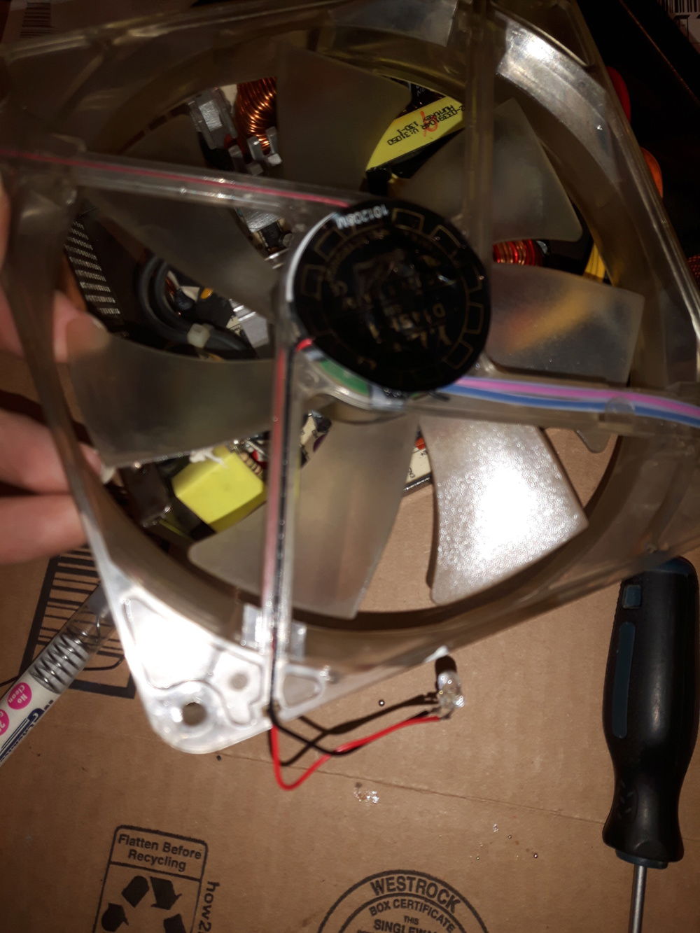 Soldered on new wires from an old case fan, and pressed them into the groove leading to the other side.