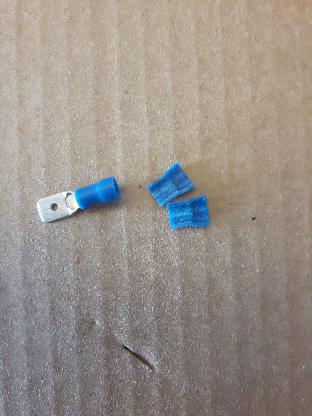 The screws that would fit through the 20mm fans were too small to grip the northbridge heat sink fins, so i cut up the plastic from an electrical connector to give something for the screws to grip.
