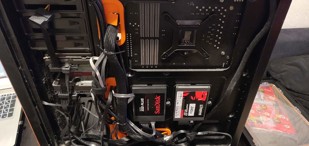 Right side of PC, filled with cables and 2 SSD's