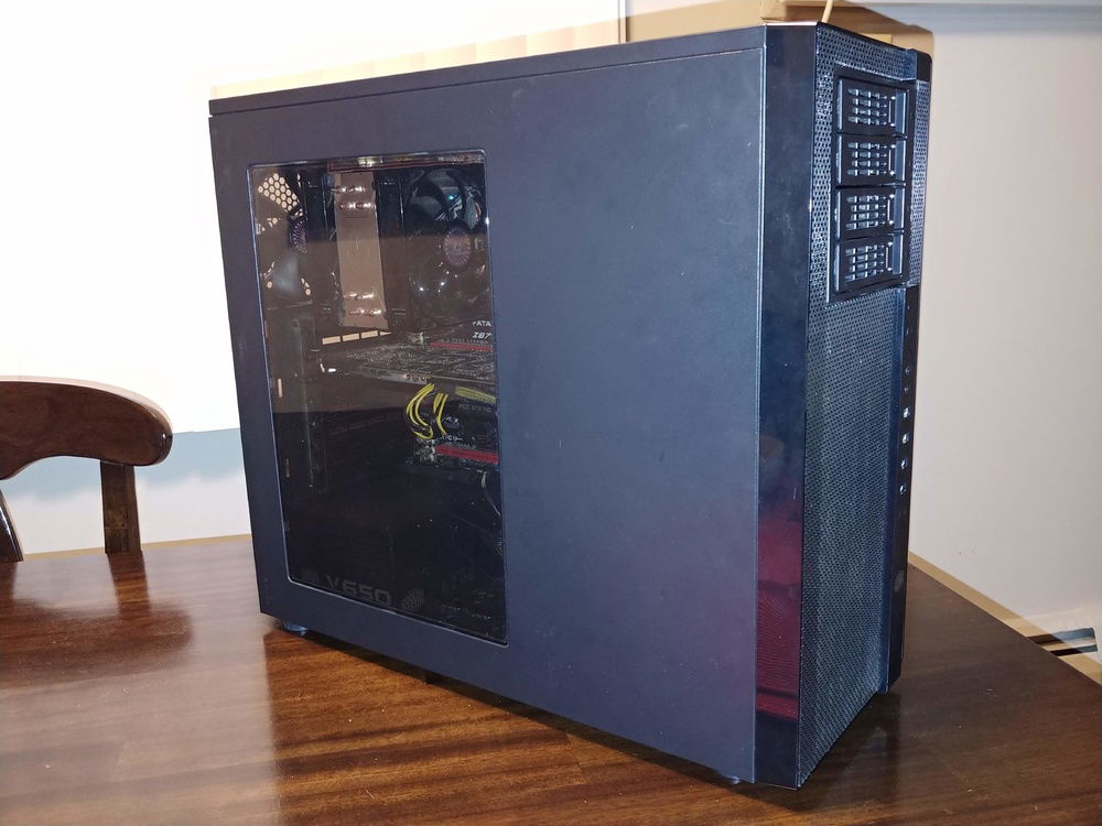Cooler Master N600 case with a Rosewill hotswap bay in the front.