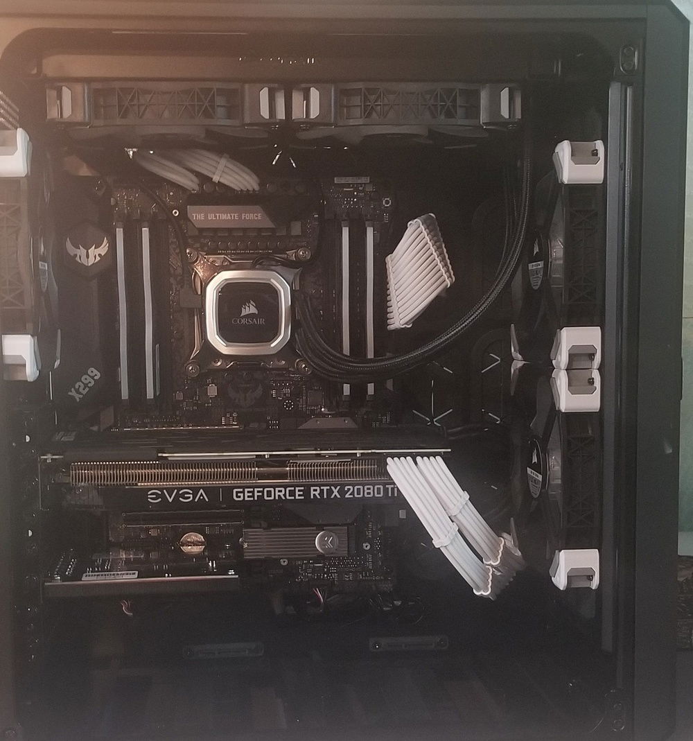 I've removed the green PCI-e adapter and moved my 970 onto the 2nd vertical m.2 connection.  Benchmarks are unchanged.  I've replaced my 960 512GB with a crucial P1000 for games storage and reused the silver EK heat spreader.