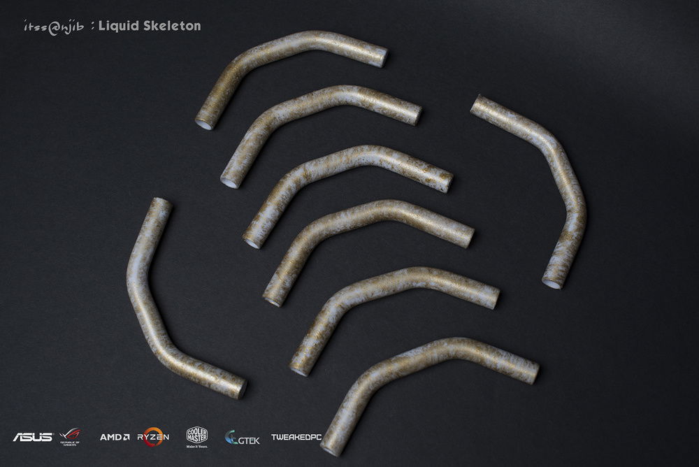 The white pet g tube with some gold paint job