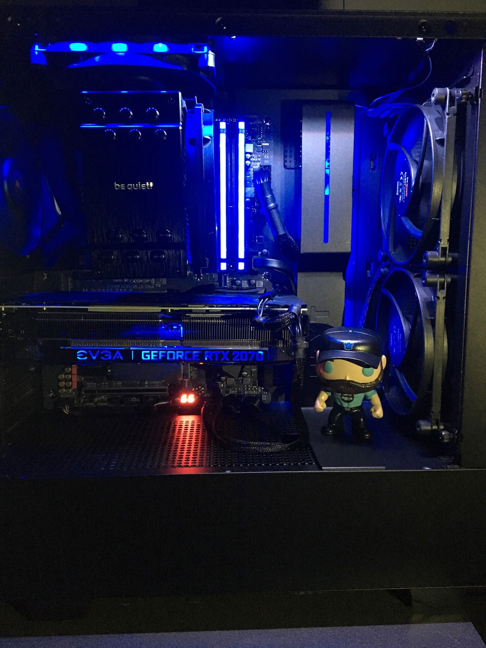 The token Custom POP! figure in case picture.