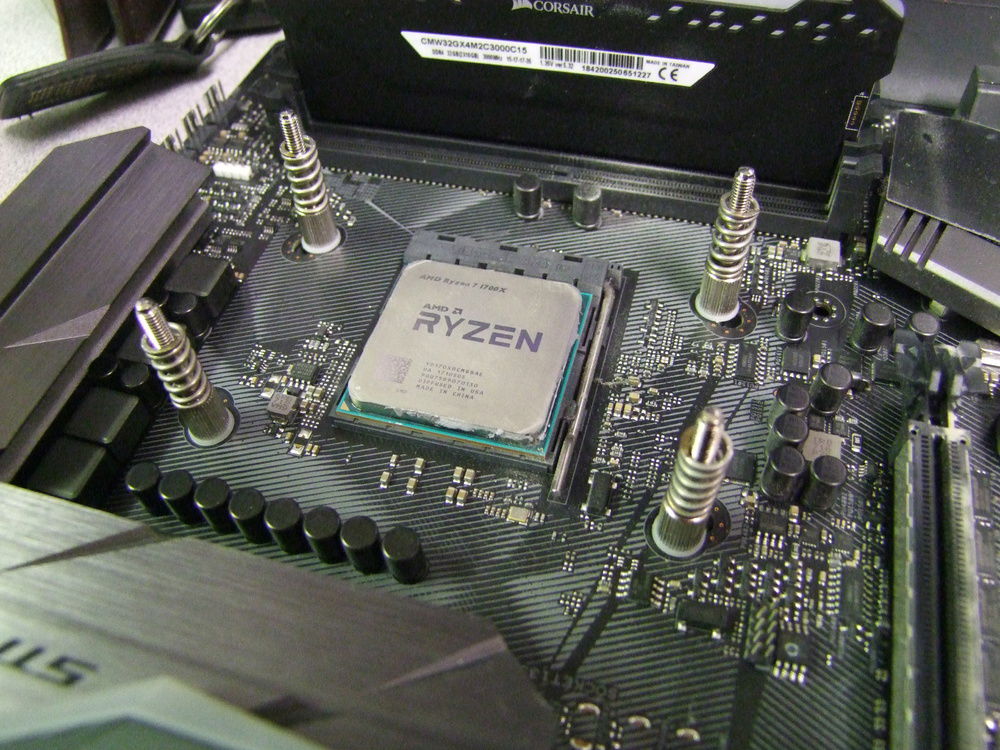 Building process: CPU backplate and retention spring installation