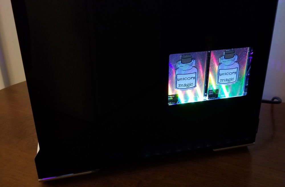 I also added a small white strip of LED's to highlight the metallic rainbow film on the SSD's.