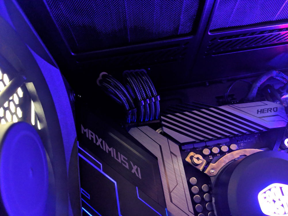 CPU 8+4 pin EPS cables. I couldn't get these close together as it's a pretty tight space up there. Those are sadly not visible anymore since I moved my radiator up top.