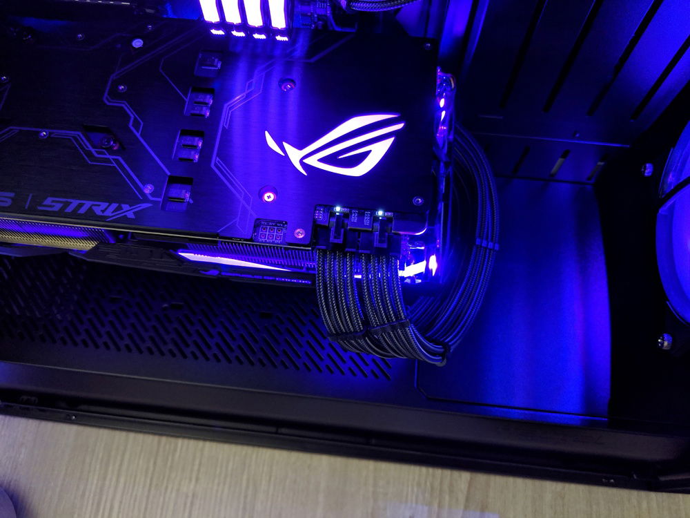 Top down shot of the GPU backplate and the 2x 8 pin cables.