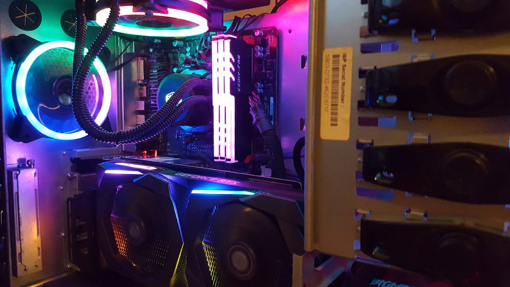 GoliathV2 was a red, black, and silver theme, however this is pictured of the RGB in action, because rainbow puke!
Quick part list: Ryzen 5 1600X, Gigabyte AB350 Gaming, 4x8GB Crucial Ballistix Sport LT with EZDIYFab aftermarket RGB heat sink, MSI RTX 2070 Gaming Z, all housed in an old Cooler Master HAF 922.