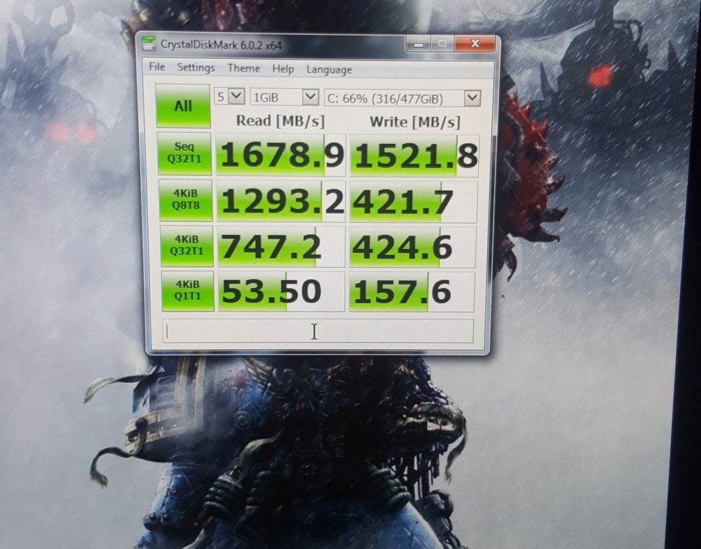 m.2 SSD Performance through the PCIe adapter card. You can see the write speed is actually being choked a bit due to X58 only have PCIe 2.0, but it's still lightning fast.