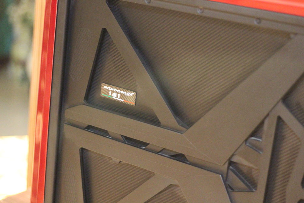 Clean motherboard trey and same model as the vehicle engine support