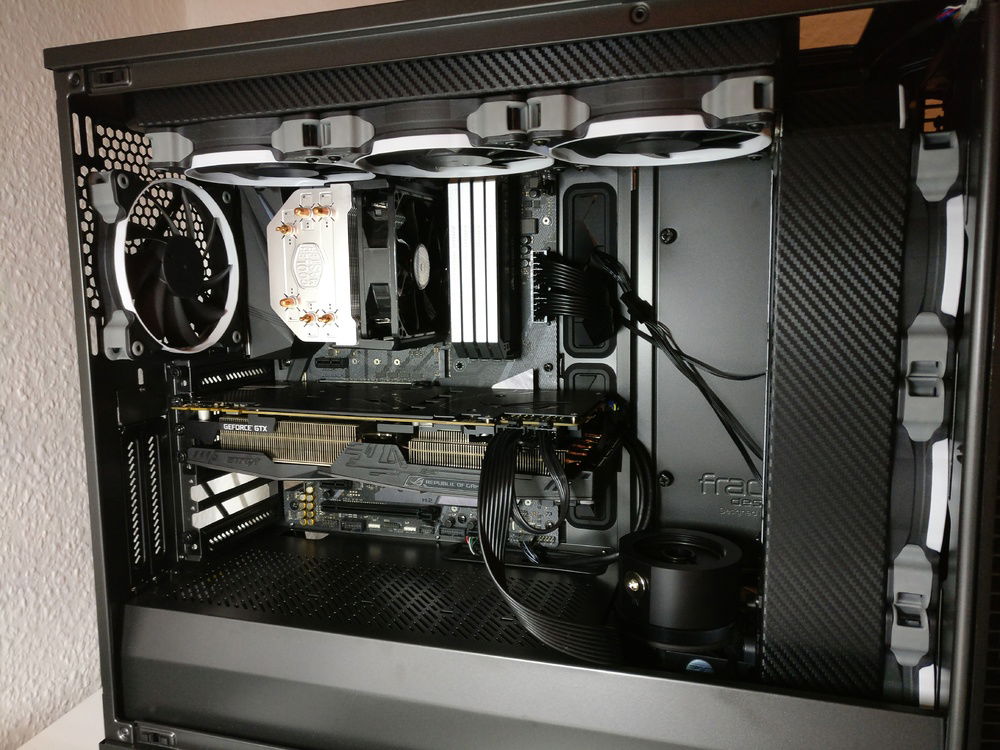 Changing the color of the radiators to carbon and add pumpe.
Test the hardware and have a working machine with least downtime as possible.