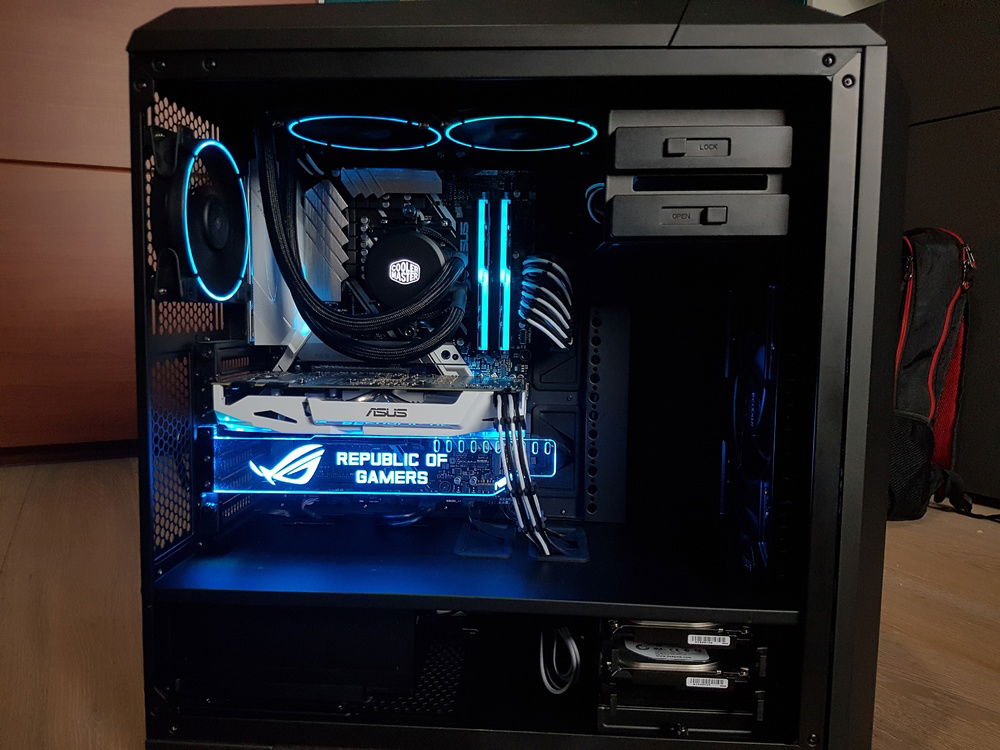 The computer, opened, and powered up