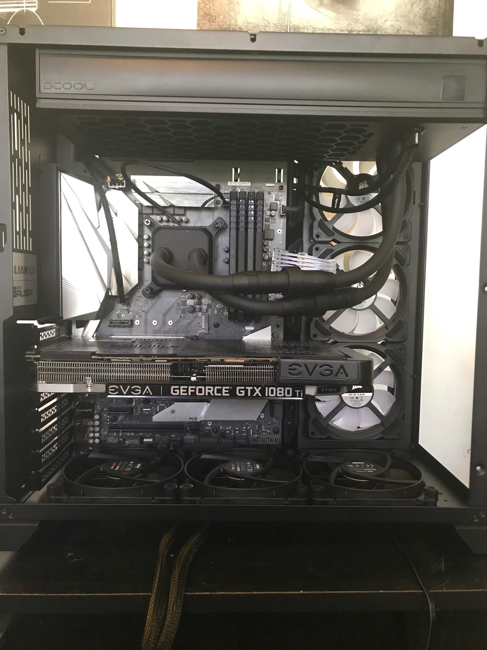 Squeezed in the Eisbaer Extreme after a adding few extra screw holes up top. Tried both directions. Other way hose is too long and kinks badly. Have reorientated the block since. It would be pefect if I was skilled enough to get some hose and fittings and run short bits from the rad/pump/res combo direct to the block and loose the long direct disconnect bits. Maybe in the future.