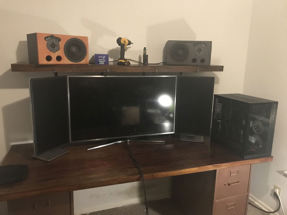 Setup as of now. Need to refinish or cover ugly monitors.