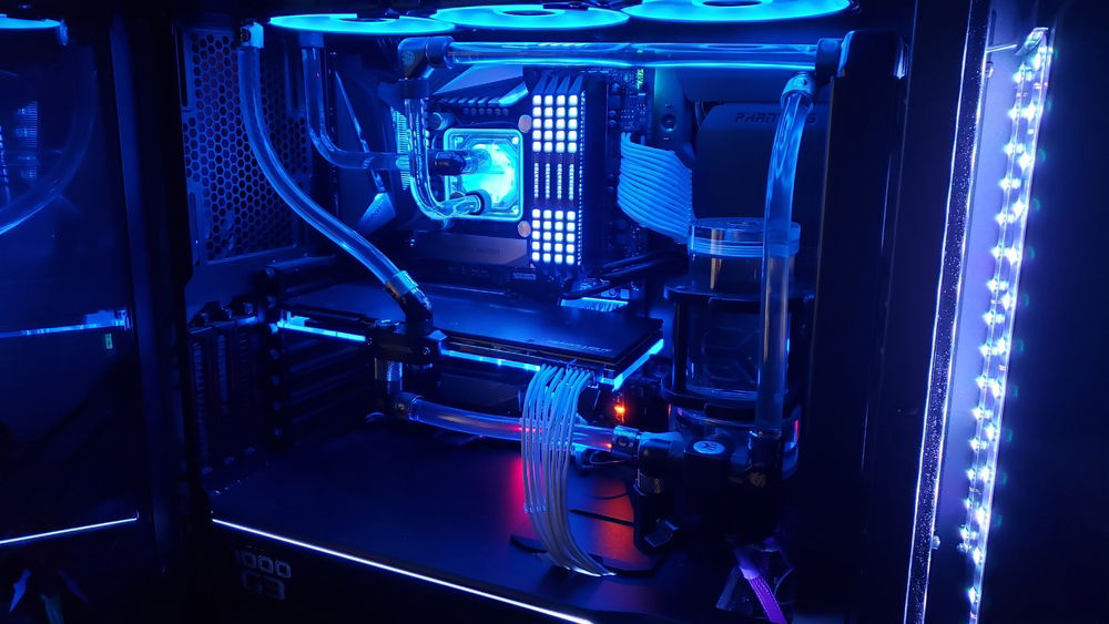 Latest Revision after fill. New (old) CPU block, expanded cooling loop with GPU and new RAM.
