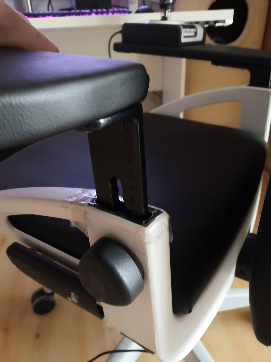 Easy to remove and adjust in the height.
I used the existing armrest device.