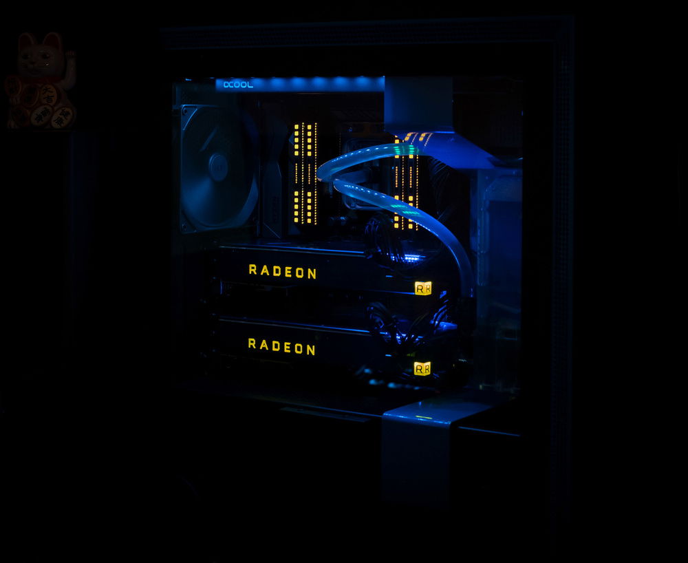 New photo of the build after upgrading to 24-core Threadripper2, new RAM, and custom cooling loop.