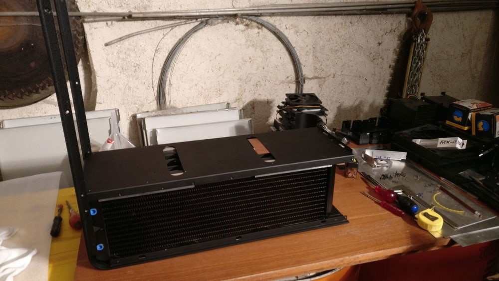 Both rads inside. The midplate still fits over them.