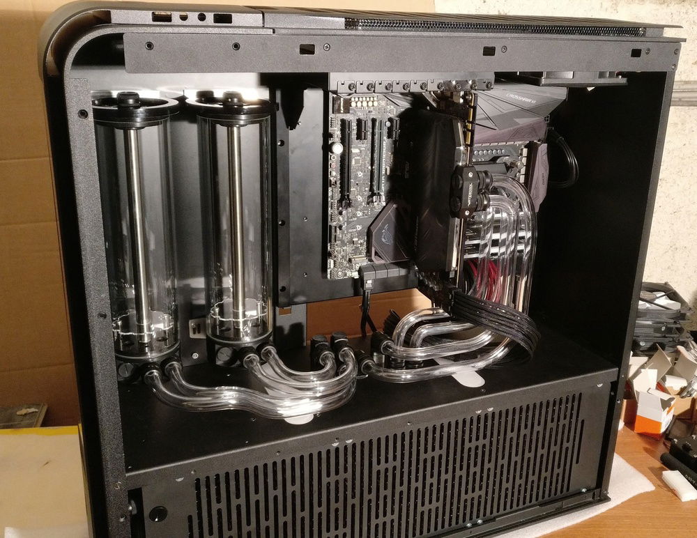 That's how the case should look like. But with better bends and tidy cables. Also the side panel on the back side is still not done. ;)
