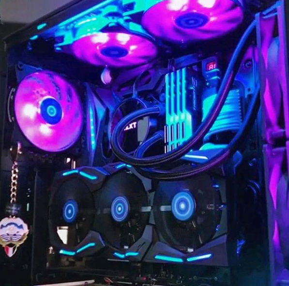 painted fan centered with blue and purple spirals , looks sick when spinning.