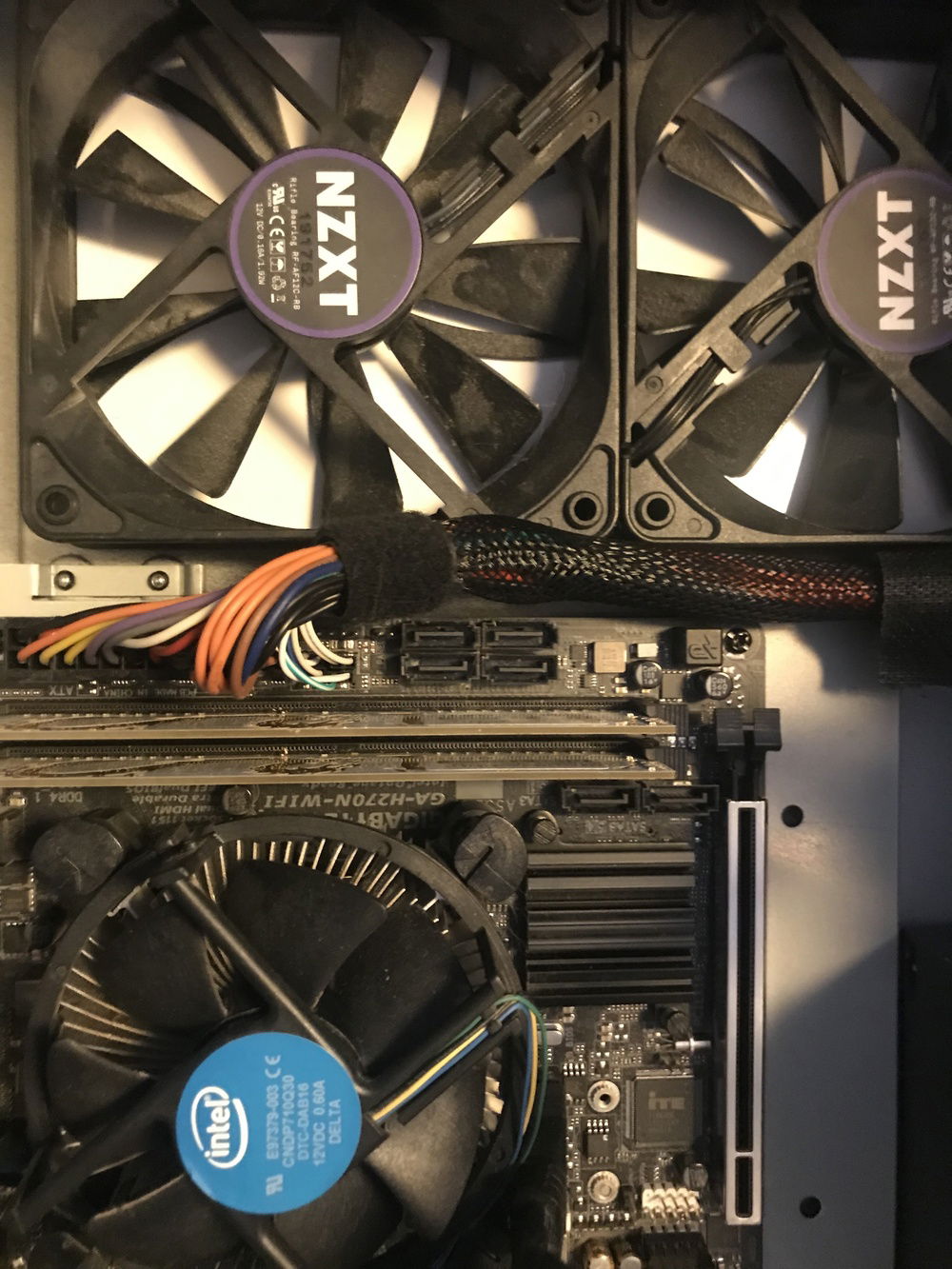 The front panel cables are  is under the sleeved 24 pin cable