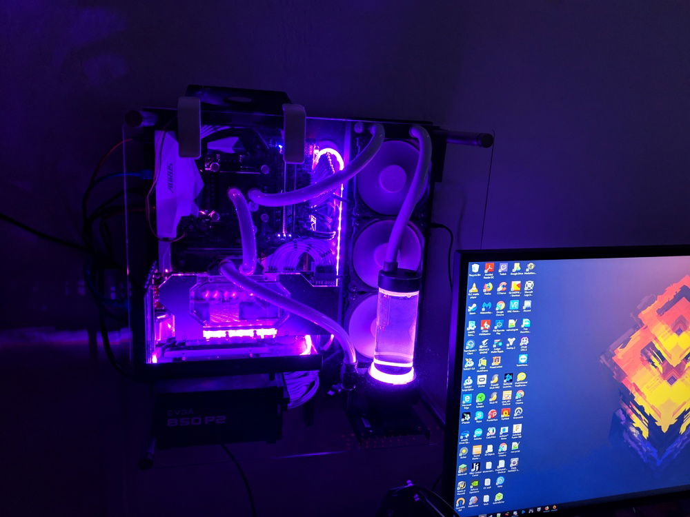 added a 140mm top fan with 3d printed mounts for ram, power phase, and m.2 cooling.