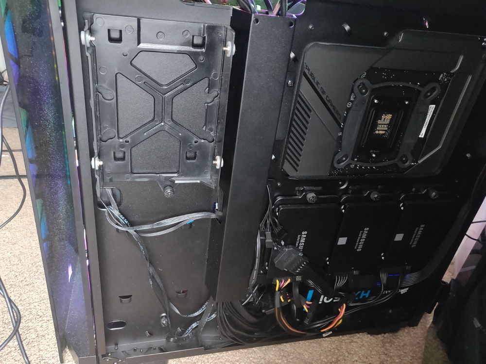 Messy cable management, don't want to bother with cables any more!!! Also, I really want to put back both of the HDD holders. But, I can't due to the Cables. (Damn)