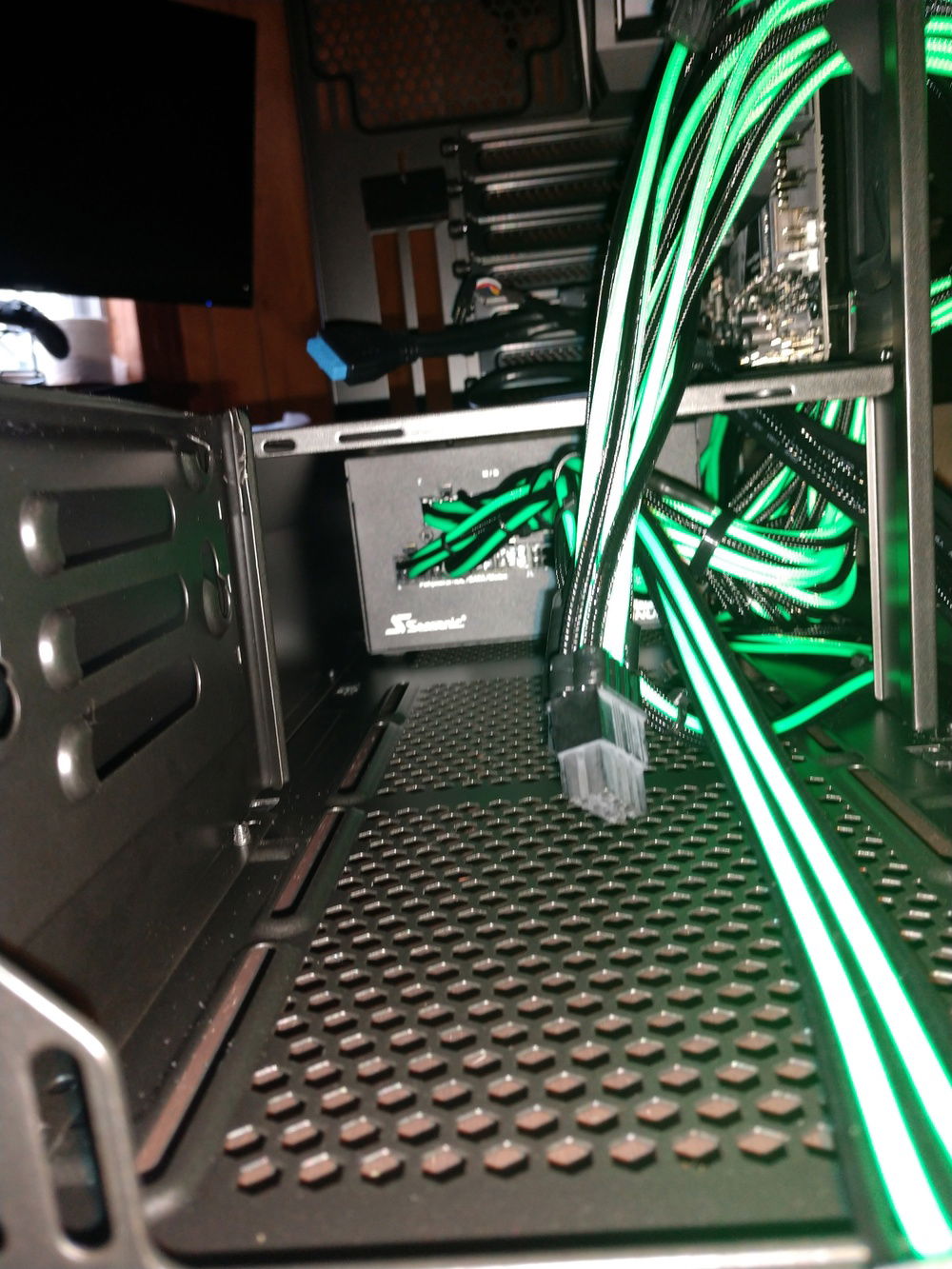 looking through the front of the case back to the PSU