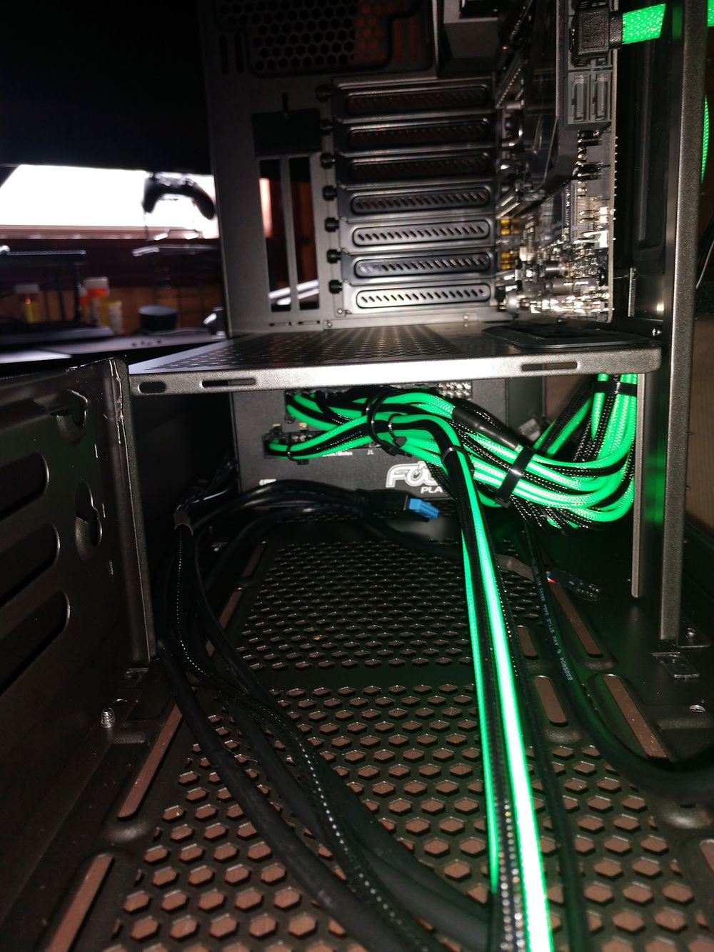 looking through the front of the case back to the PSU