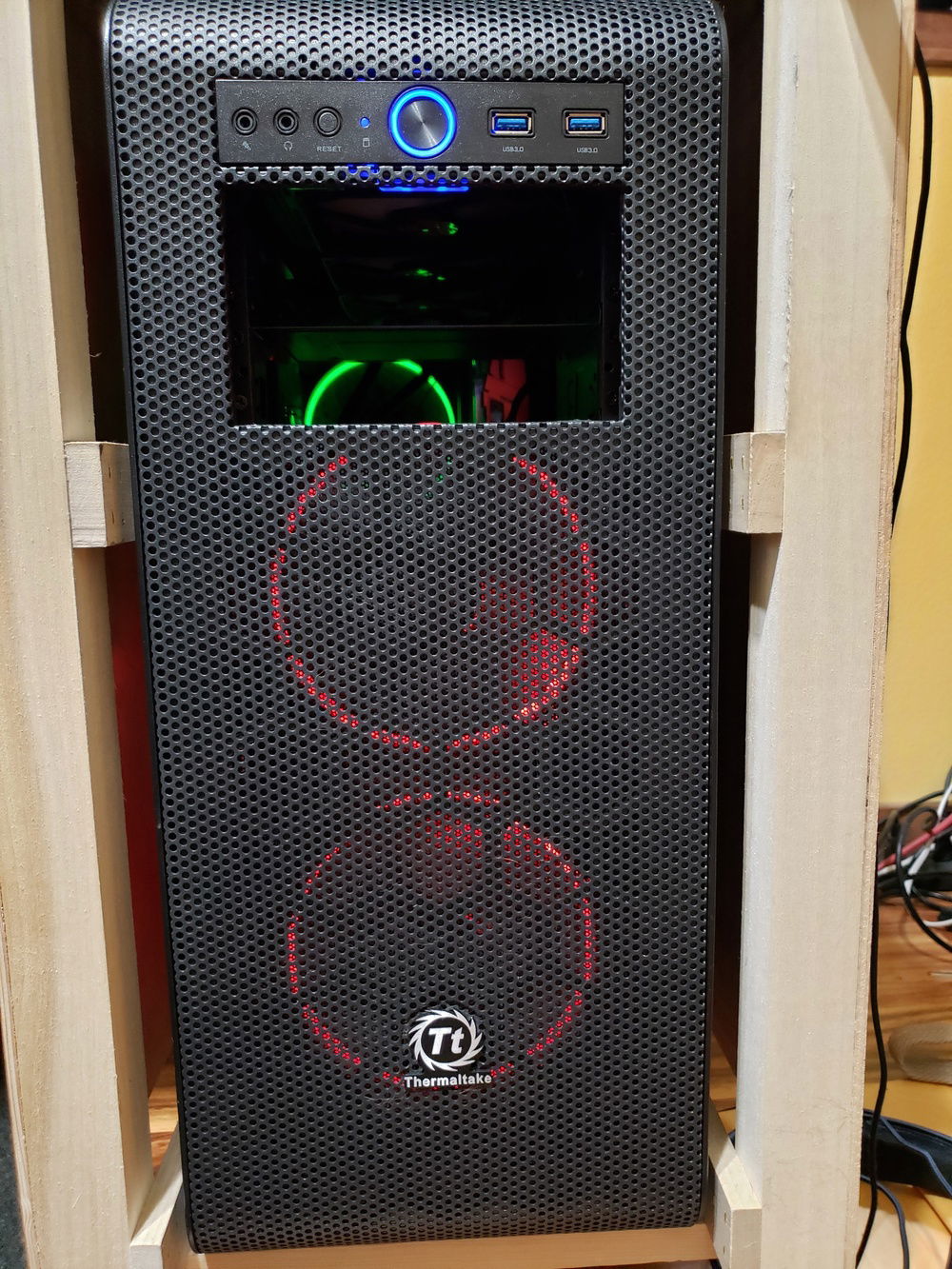 I can't take my computer out without powering down so this is the only shot I have of it right now. The green fan in the back is a spare I had at the other fan died.
