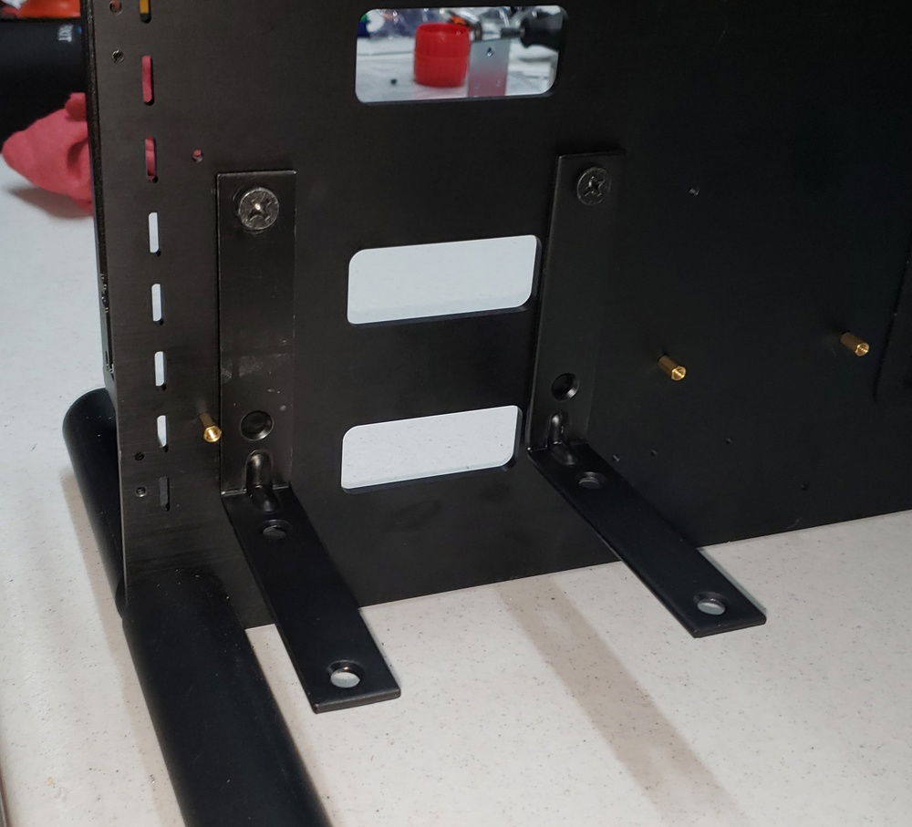 We grabbed a few basic brackets from Home Depot then cut them to fit.