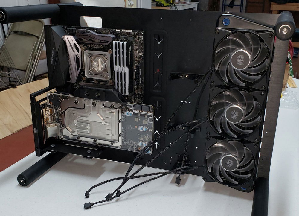 Starting to look like a computer not a piece of scrap metal! Decided to go with a AlphaCool X45 360mm. Wanted to spread the tubing out to have as little blank space as possible so we decided tubing coming from the top and bottom of the rad would look best.