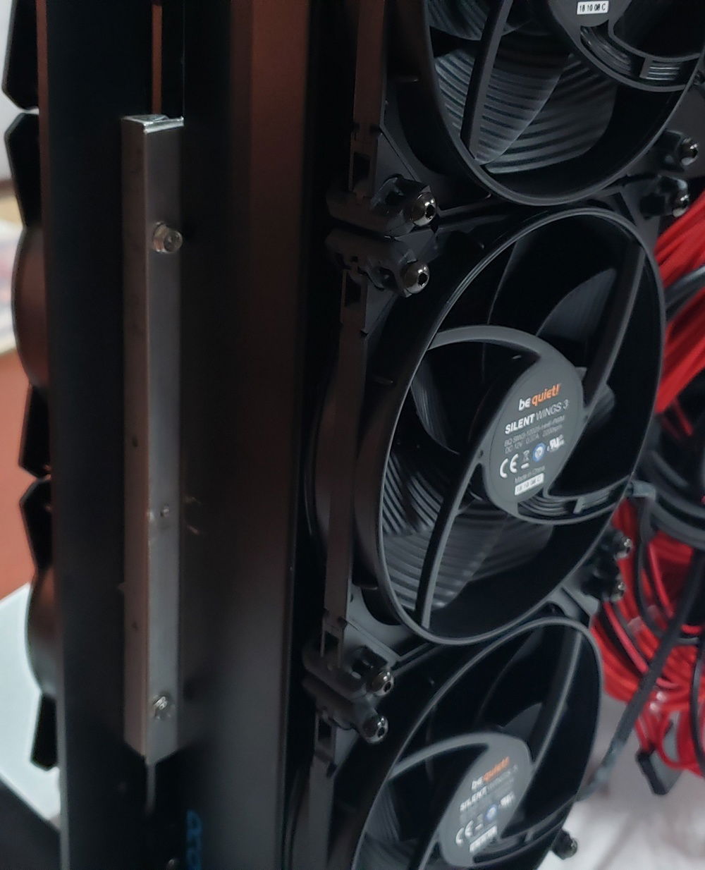 Added a set of BeQuiet Wing 3 fans to the back radiator.