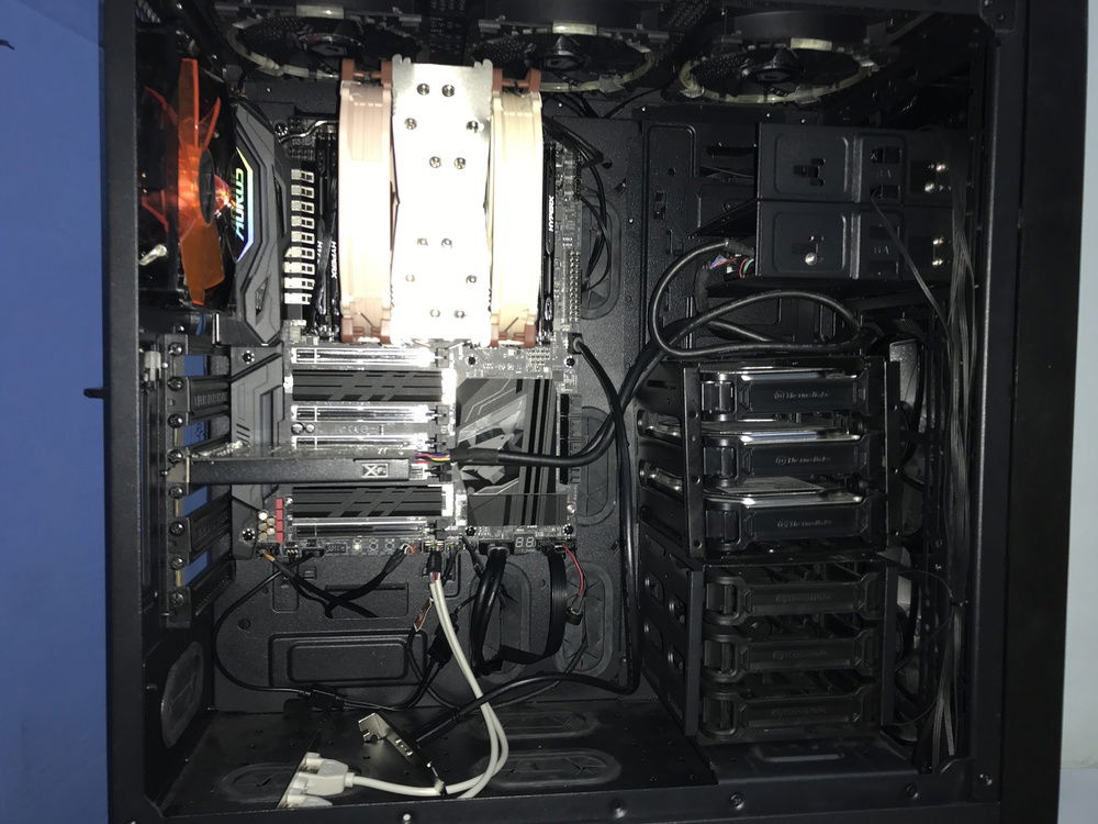 Board installed and wired up partially. Also, configured the dual NF-A15s and moved the Xigmatek down inline with the twin cooler fans. All that’s left are the GPUs, PSU and SATA cabling. Also, the final 3 hard drives and the caching SATA SSD. 

I’ll leave the USB brackets hanging for now. It only makes sense to secure them once the GPUs are in.