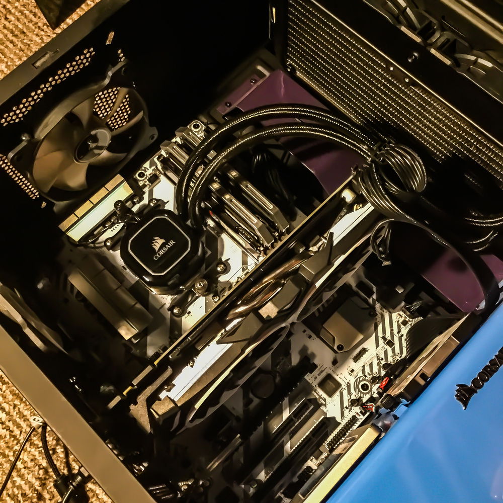 Internal view of computer, showing spray-painted cable shroud and layout