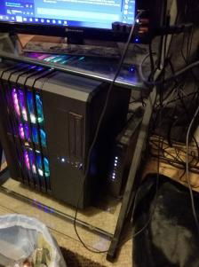 this is where it currently sits, right next to the modem and completely hooked up lifted off the ground.