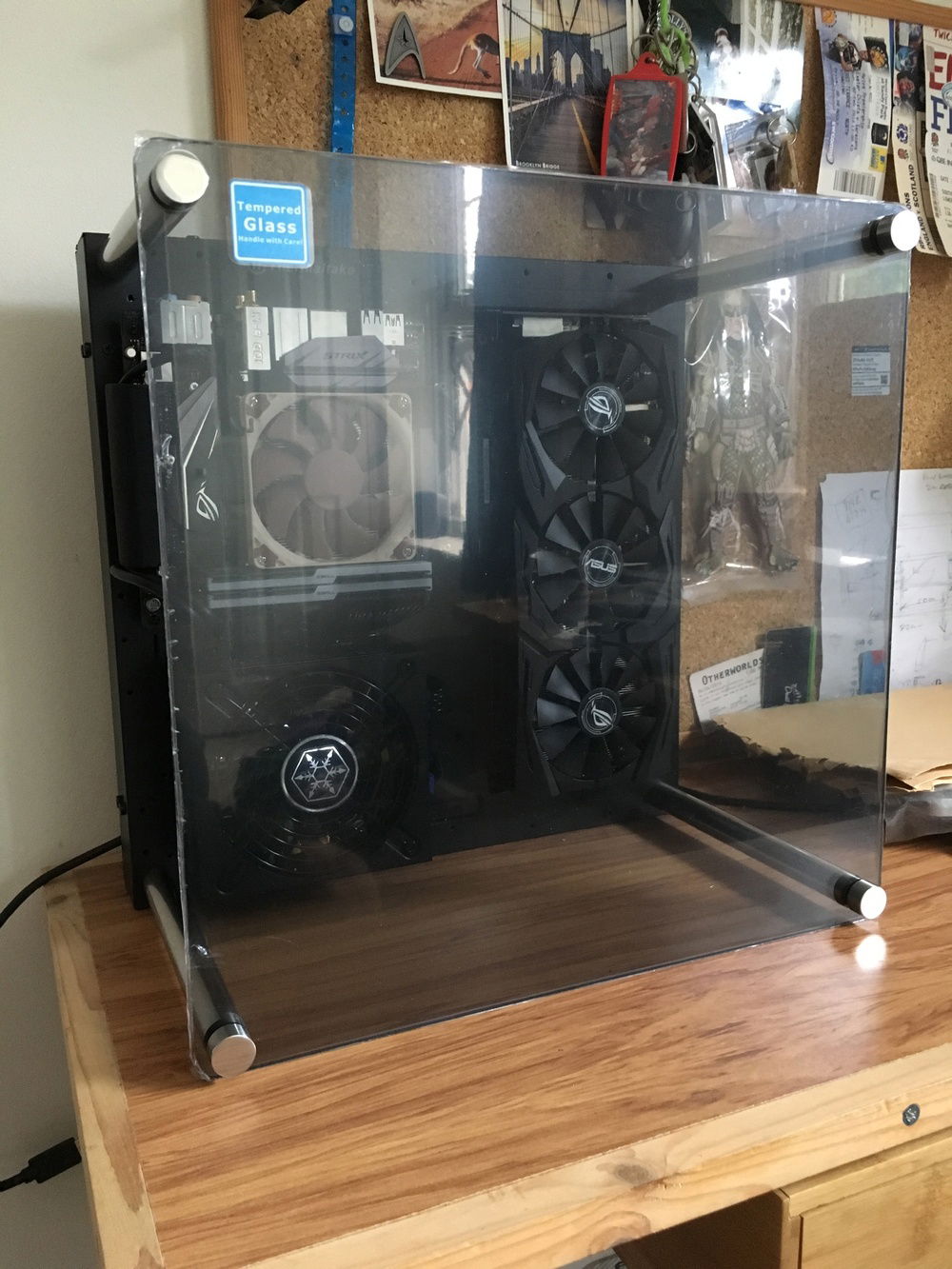 Glass panel now on and as you can see the rods holding the glass in place are still stupidly long.